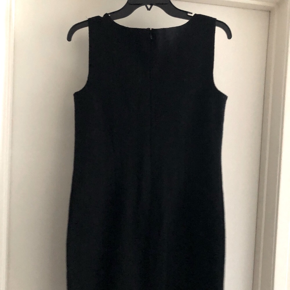 Little black dress with ruffles, wool, elegant.
